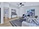 Bright living room showcasing modern design, light wood floors, and a cozy seating area with lots of light at 8501 W Highland Ave, Phoenix, AZ 85037