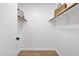 A walk-in closet featuring white shelving and clothes racks at 8501 W Highland Ave, Phoenix, AZ 85037