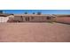 Gravel backyard featuring a neutral-colored fence at 8818 W Pinchot Ave, Phoenix, AZ 85037