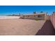 Gravel backyard with block wall, providing privacy at 8818 W Pinchot Ave, Phoenix, AZ 85037