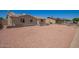 Quaint single-level house with a spacious front yard and traditional architecture at 8818 W Pinchot Ave, Phoenix, AZ 85037