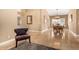 Inviting dining area with classic wood furniture, a chandelier, and ample natural light, perfect for gatherings at 882 N Concord Ave, Chandler, AZ 85225