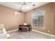 Bright room with a ceiling fan, window, and light wood flooring, perfect as an office or study at 882 N Concord Ave, Chandler, AZ 85225