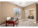 Versatile room with a window, light wood flooring, and ample space, suitable for various purposes at 882 N Concord Ave, Chandler, AZ 85225