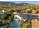 An aerial view displays the property including the pool, patio, and outdoor seating area at 13 W Silverwood Dr, Phoenix, AZ 85045