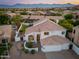 Aerial view showcases a spacious yard, pool area, landscaping, and well maintained house at 13 W Silverwood Dr, Phoenix, AZ 85045