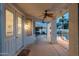 Covered back patio with ceiling fans overlooking the pool and pergola, creating a relaxing outdoor space at 13 W Silverwood Dr, Phoenix, AZ 85045