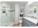 Clean bathroom featuring a tiled glass shower and a vanity with marble countertops at 13 W Silverwood Dr, Phoenix, AZ 85045