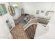Bright foyer with staircase, natural light, and neutral décor provides a welcoming entry at 13 W Silverwood Dr, Phoenix, AZ 85045