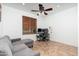 Bright and airy office space with a large window, desk setup, and neutral decor at 13 W Silverwood Dr, Phoenix, AZ 85045