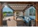 Inviting covered patio with comfortable seating, perfect for outdoor relaxation and entertaining at 13 W Silverwood Dr, Phoenix, AZ 85045