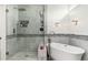 This bright bathroom features a glass shower with shower-head and a soaking tub at 13 W Silverwood Dr, Phoenix, AZ 85045