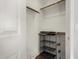 Walk-in closet with installed shelving and ample storage space at 13373 W Boca Raton Rd, Surprise, AZ 85379