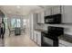 Bright kitchen with updated appliances, sleek countertops, and a cozy breakfast nook at 13373 W Boca Raton Rd, Surprise, AZ 85379