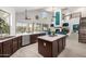Spacious kitchen with marble countertops, stainless steel appliances, and a large island for entertaining at 13636 W Calavar Rd, Surprise, AZ 85379