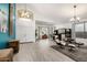 Spacious living room boasting high ceilings, modern decor, and abundant natural light at 13636 W Calavar Rd, Surprise, AZ 85379