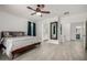 Spacious primary bedroom with adjoining bath and a walk-in closet at 13636 W Calavar Rd, Surprise, AZ 85379