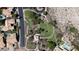 Birds-eye view of common area with a grassy park, gazebo, and walking paths amid desert landscaping at 14609 S 24Th Way, Phoenix, AZ 85048