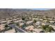 Panoramic aerial view showcasing a charming desert community nestled amidst rolling hills, with homes featuring pools at 14609 S 24Th Way, Phoenix, AZ 85048