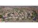 An aerial view showing a well-planned community with a blend of green trees and desert landscaping for an eye-catching scene at 14609 S 24Th Way, Phoenix, AZ 85048