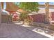 Spacious backyard patio with shade sail, ideal for outdoor gatherings and relaxation at 14609 S 24Th Way, Phoenix, AZ 85048