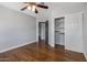 Bedroom with hardwood floors, ceiling fan, closet, and lots of natural light at 14609 S 24Th Way, Phoenix, AZ 85048