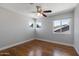 Empty bedroom with hardwood floors, ceiling fan, and great natural light at 14609 S 24Th Way, Phoenix, AZ 85048