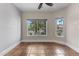 Bedroom featuring a large window with a view and tiled floors at 14609 S 24Th Way, Phoenix, AZ 85048