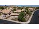 Beautiful two-story home featuring a tile roof, lush landscaping, and a convenient two-car garage at 14609 S 24Th Way, Phoenix, AZ 85048