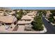 Well-maintained two-story home boasts a tile roof, mature trees, and a spacious two-car garage at 14609 S 24Th Way, Phoenix, AZ 85048