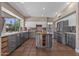 Modern kitchen with stainless appliances, island, and white countertops offering a contemporary design at 14609 S 24Th Way, Phoenix, AZ 85048