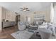 Cozy living room featuring stylish furnishings, neutral décor, and tile floors, creating an inviting atmosphere at 14609 S 24Th Way, Phoenix, AZ 85048