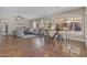 Open concept living area featuring tile floors, a dining table, and a comfortable seating arrangement at 14609 S 24Th Way, Phoenix, AZ 85048
