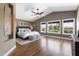 Spacious main bedroom with hardwood floors, ceiling fan, and great natural light at 14609 S 24Th Way, Phoenix, AZ 85048