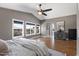 Spacious main bedroom featuring hardwood floors, vaulted ceilings and view to neighborhood at 14609 S 24Th Way, Phoenix, AZ 85048