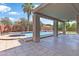Inviting covered outdoor area showcases the sparkling pool and spa for ultimate relaxation and enjoyment at 14609 S 24Th Way, Phoenix, AZ 85048