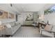 Cozy living room with vintage accent cabinet and view of backyard at 1522 W Myrtle Ave, Phoenix, AZ 85021