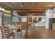 Open floor plan showcasing living room with fireplace and formal dining area with wood accents at 1522 W Myrtle Ave, Phoenix, AZ 85021