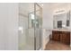 The bathroom is equipped with a walk-in shower and a separate soaking tub at 15674 W Mackenzie Dr, Goodyear, AZ 85395