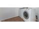 Laundry room featuring a washing machine and a dryer at 15674 W Mackenzie Dr, Goodyear, AZ 85395