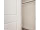 Walk in closet featuring neutral carpet and painted white walls at 162 N Hunt W Dr, Mesa, AZ 85203