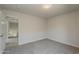 Comfortable bedroom featuring neutral carpet and an open doorway at 1671 E Silktassel Trl, San Tan Valley, AZ 85143