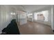 Bright kitchen with white cabinets, island, and tile flooring at 19007 N 79Th Dr, Glendale, AZ 85308