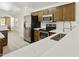 Modern kitchen featuring stainless steel appliances and quartz countertops at 2011 W Burgess Ln, Phoenix, AZ 85041