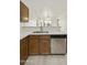 Modern kitchen features stainless steel appliances and bright countertops at 2011 W Burgess Ln, Phoenix, AZ 85041