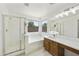 Luxurious main bathroom features a soaking tub, separate shower, and a vanity with ample counter space at 2011 W Burgess Ln, Phoenix, AZ 85041