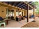 Charming patio area with ample seating and a well-designed pergola at 21014 W Ridge Rd, Buckeye, AZ 85396