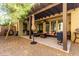 Inviting covered back patio perfect for outdoor entertaining and relaxation at 21014 W Ridge Rd, Buckeye, AZ 85396
