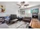 Bright bedroom with ceiling fan, decor and games for entertainment at 21014 W Ridge Rd, Buckeye, AZ 85396