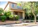 Charming two-story home with a welcoming front porch and manicured landscaping at 21014 W Ridge Rd, Buckeye, AZ 85396